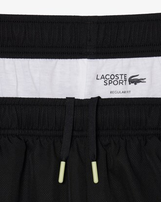 Shorts sportivi con banda in taffet&agrave; a rombi