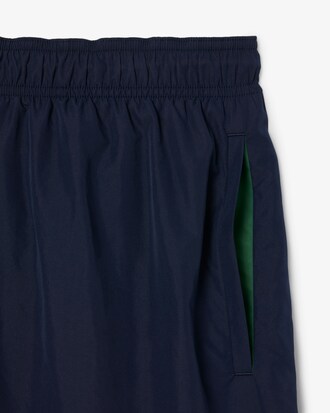 Pantaloncini da bagno monocromatici di lunghezza media