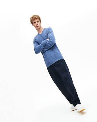 Pullover con collo a V in jersey di lana tinta unita