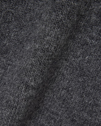 Maglione a collo alto in lana cardata