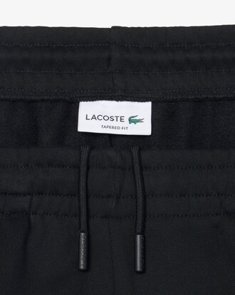 Pantaloni della tuta tapered fit in tessuto felpato