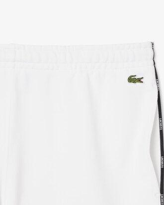 Shorts in cotone felpato con profili con logo