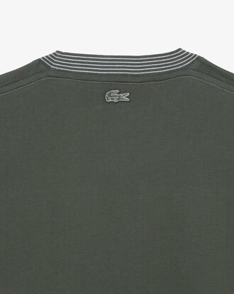 T-shirt in jersey di cotone ricamato e stampato