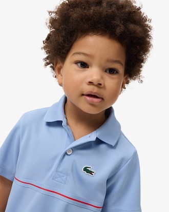 Polo in piqu&eacute; Ultra Dry a righe con marchio