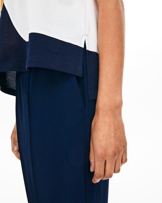 Polo da donna in piqu&eacute; con propriet&agrave; di termoregolazione color block Lacoste