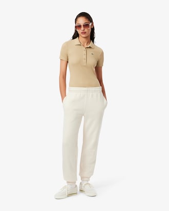 Pantaloni in tessuto felpato con logo goffrato