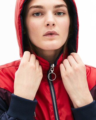 Giacca da donna lunga, imbottita, resistente all'acqua e double face con opzione color block