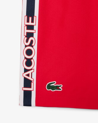 Shorts sportivi a righe con logo
