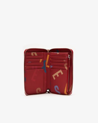 Portafoglio da donna con zip in canvas spalmato con stampa e manico da polso Daily Classic