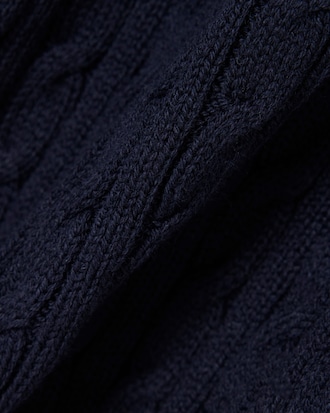 Maglione a righe in maglia a trecce con collo a polo