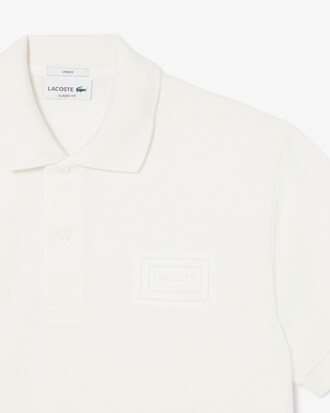 Polo classic fit con marchio in rilievo