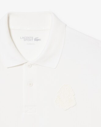 Polo da golf in mini piqu&eacute; elasticizzato con stemma