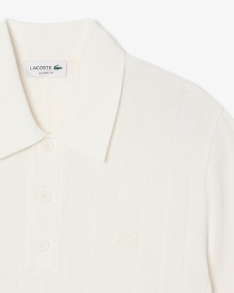 Maglione fluido in maglia a coste con collo a polo