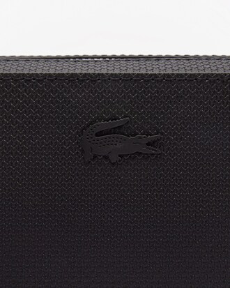 Pochette con zip in pelle effetto piqué Chantaco