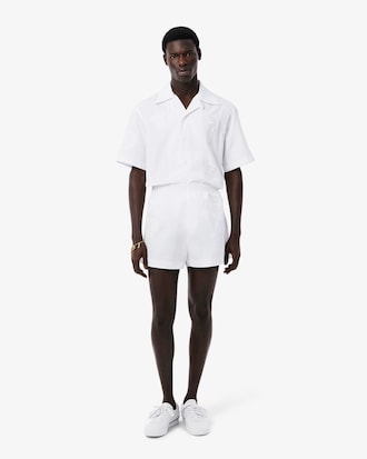 Shorts con stemma in pizzo Runway