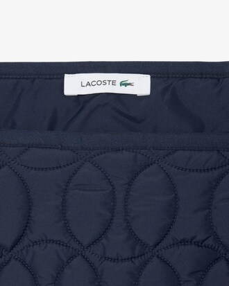 Gonna corta idrorepellente trapuntata con motivo tennis