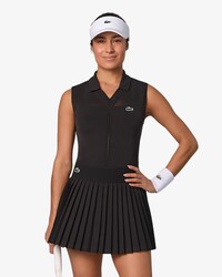 Polo da tennis smanicata in maglia elasticizzata