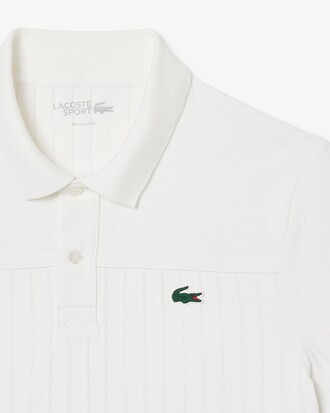 Polo da tennis Ultra Dry con badge Accent Heritage