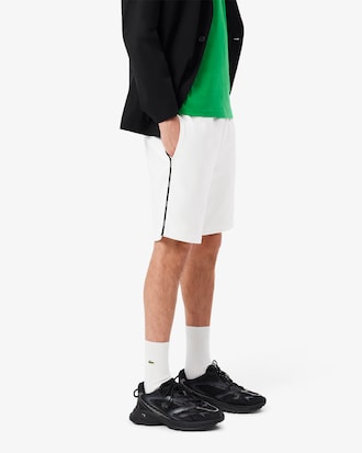 Shorts in cotone felpato con profili con logo