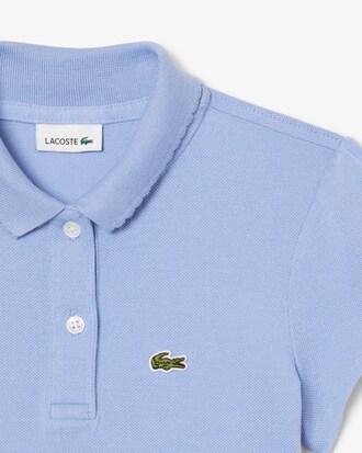 Polo in piqu&eacute; con collo smerlato