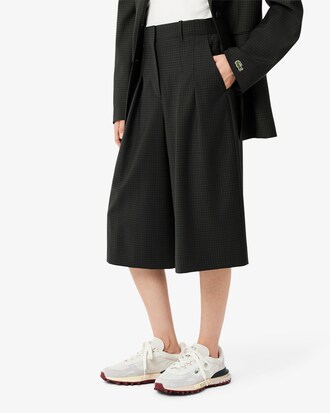 Bermuda oversize lunghi taglio ampio con pieghe