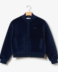 Giacca da donna corta e imbottita in morbido velour con motivo chevron