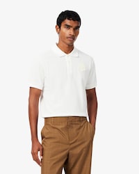 Polo da golf in mini piqu&eacute; elasticizzato con stemma