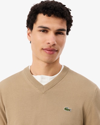 Maglione monocromatico in cotone con scollo a V