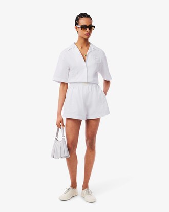 Shorts con stemma in pizzo Runway