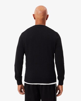 Maglione monocromatico in cotone con scollo a V