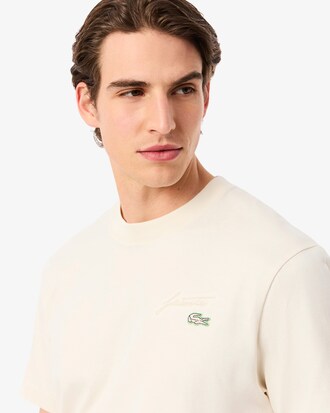 T-shirt con ricamo tradizionale in jersey pesante