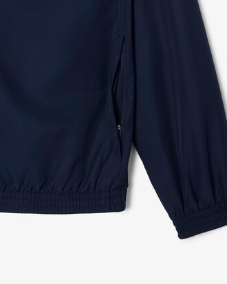 Tuta da tennis con logo a righe