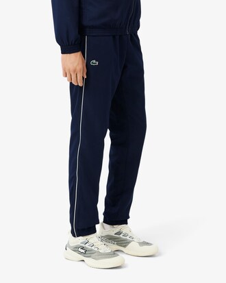 Tuta da tennis con logo a righe