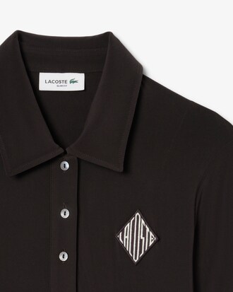 Abito a polo slim fit con stemma ricamato