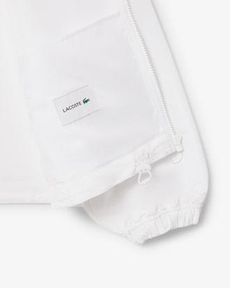Giacca cropped con cappuccio e zip