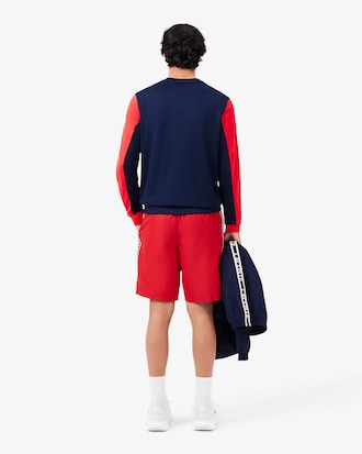 Shorts sportivi a righe con logo