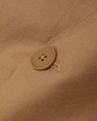 Giacca in tela idrorepellente con zip corta e stemma