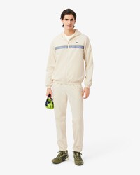 Tuta da tennis con logo a righe
