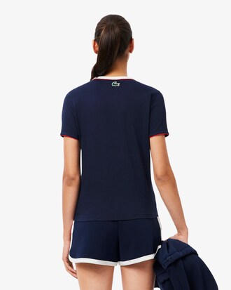T-shirt da tennis Ultra Dry con badge Heritage