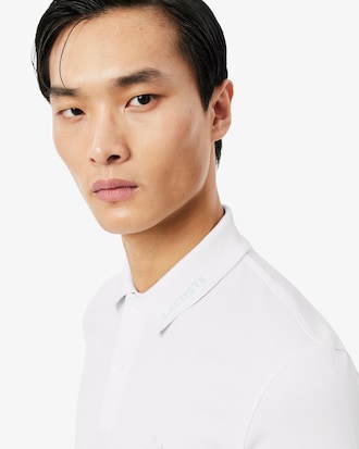 Polo con marchio jacquard slim fit