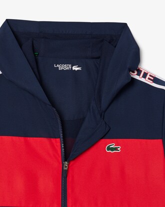 Giacca sportiva a righe con logo color block