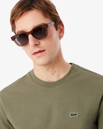 T-shirt con fascia a righe con marchio