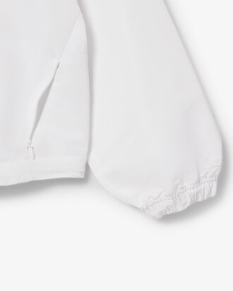 Giacca cropped con cappuccio e zip