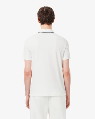 Polo Tennis Heritage Ultra Dry con stemma