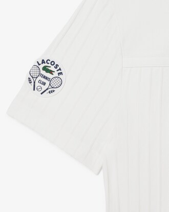 Polo da tennis Ultra Dry con badge Accent Heritage