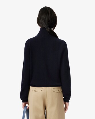 Maglione a collo alto in lana cardata