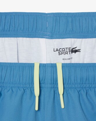 Shorts sportivi con bordo decorativo in taffet&agrave; a rombi