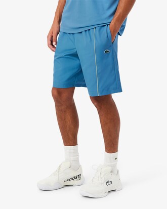 Shorts sportivi con bordo decorativo in taffet&agrave; a rombi