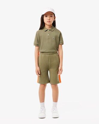 Shorts in pile con righe a contrasto