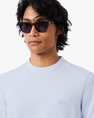 T-shirt in piqu&eacute; con marchio jacquard Commuter